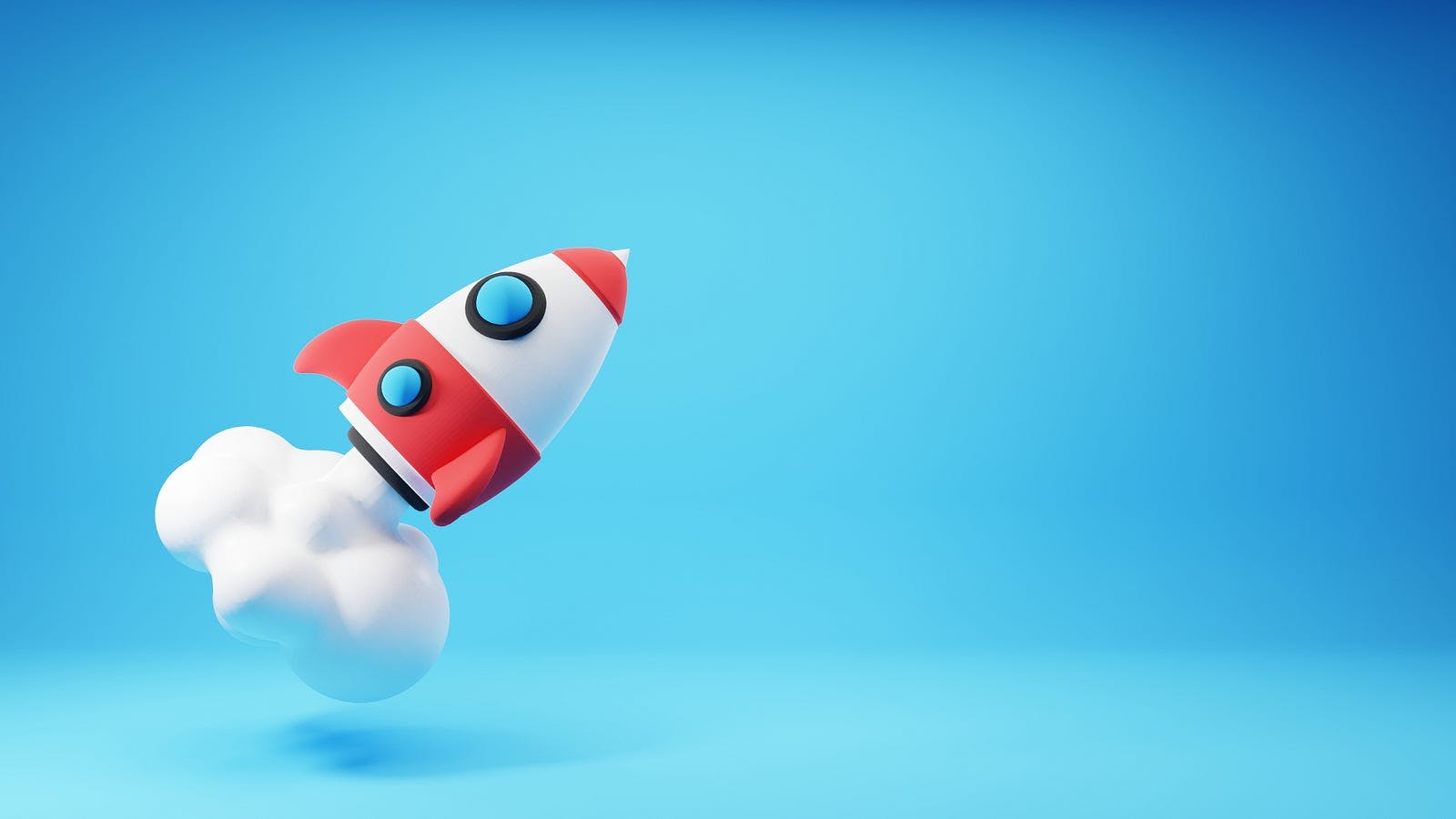 A red and white toy rocket ship flying through the air on a blue background with a white cloud in the foreground